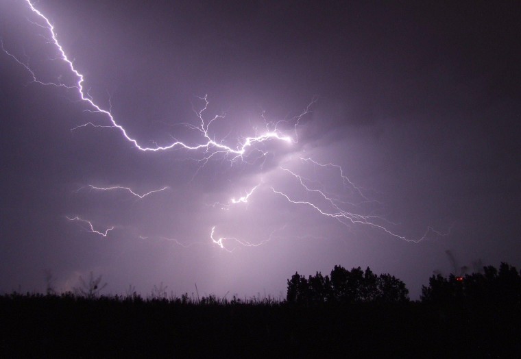 lightning strike on dark night sky